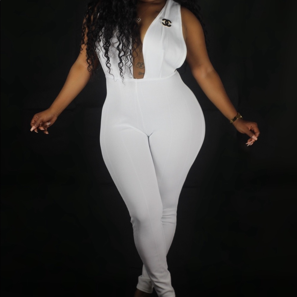 White deep cut jumpsuit